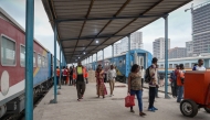 This screen grab taken from an AFP Video shows commuters walking on the platform as they leave the train at the central station in Kinshasa, on August 28, 2026. (Photo by GLODY MURHABAZI / AFP)