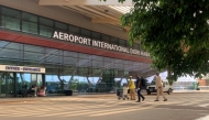(FILES) Passengers arrive at the Diori Hamani International airport in Niamey on September 22, 2023. (Photo by AFP)