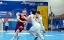 Action during the semi-final between Qatar and Republic of Korea. 