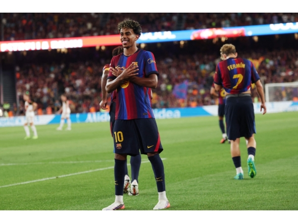 Barcelona's Spanish forward #10 Lamine Yamal celebrates scoring his team's fifth goal during the Spanish league football match between FC Barcelona and Rayo Vallecano de Madrid at Camp Nou Stadium in Barcelona on August 31, 2026. (Photo by Lluis GENE / AFP)