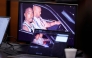 A 1996 photo of rapper Tupac Shakur (L) and Marion “Suge” Knight is shown on screens during closing arguments in the Duane Davis murder trial, related to the 1996 killing of rapper Tupac Shakur, at Clark County District Court at the Regional Justice Center in Las Vegas, Nevada, on August 31, 2026. (Photo by STEVE MARCUS / POOL / AFP)