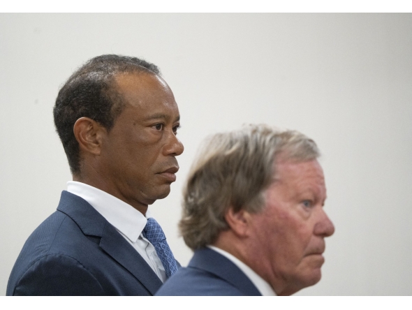 US golfer Tiger Woods (L) appears in County Judge Darren Steele's courtroom for a plea hearing from an arrest in March at the Martin County Courthouse in Stuart, Florida in September 2, 2026. Photo by Crystal Vander Weit / POOL / AFP