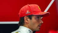 Ferrari's Monegasque driver Charles Leclerc looks on in the pits ahead of the qualifying session of the Italian Formula One Grand Prix at the Autodromo Nazionale Monza circuit in Monza, northern Italy on September 5, 2026. (Photo by ANNA SZILAGYI / POOL / AFP)