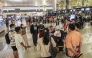 Stranded passengers gather as they wait at Soekarno-Hatta Airport in Tangerang on September 6, 2026. The Airport has been temporarily closed to all flight operations due to ash spewing from the Anak Krakatoa volcano. (Photo by Syarief Akbar / AFP) 