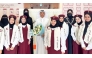MoEHE Undersecretary Dr. Ibrahim bin Saleh Al Nuaimi with officials and students during his visit to a school yesterday.