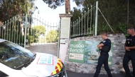 Police officers patrol in front of the entrance of the Musee Renoir after four paintings, valued at nine million euros, were stolen from the museum in an early-morning break-in, with two suspects still at large, in Cagnes-sur-Mer on September 8, 2026. (Photo by Valery HACHE / AFP)