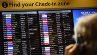 Cancelled flights are pictured on an electronic check-in display board at Terminal 3 of London Heathrow airport, west of London on September 8, 2026, following major disruption due an issue affecting the NATS air traffic control systems. Photo by Henry NICHOLLS / AFP
