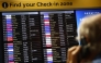 Cancelled flights are pictured on an electronic check-in display board at Terminal 3 of London Heathrow airport, west of London on September 8, 2026, following major disruption due an issue affecting the NATS air traffic control systems. Photo by Henry NICHOLLS / AFP