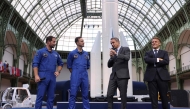 (From L) French European Space Agency (ESA) astronaut Thomas Pesquet, Greek aviation medical examiner and European Space Agency (ESA) astronaut candidate Adrianos Golemis, Greece's Prime Minister Kyriakos and France's President Emmanuel Macron speak during the International Space Summit at the Grand Palais in Paris on September 9, 2026. (Photo by Ludovic MARIN / POOL / AFP)