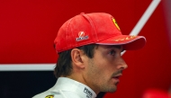 Ferrari's Monegasque driver Charles Leclerc looks on in the pits ahead of the qualifying session of the Italian Formula One Grand Prix at the Autodromo Nazionale Monza circuit in Monza, northern Italy on September 5, 2026. (Photo by ANNA SZILAGYI / POOL / AFP)
