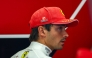 Ferrari's Monegasque driver Charles Leclerc looks on in the pits ahead of the qualifying session of the Italian Formula One Grand Prix at the Autodromo Nazionale Monza circuit in Monza, northern Italy on September 5, 2026. (Photo by ANNA SZILAGYI / POOL / AFP)
