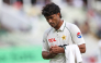 Pakistan's Razaullah leaves the field for treatment on an injury on day four of the third Test match between England and Pakistan at Edgbaston cricket ground in Birmingham on September 12, 2026. (Photo by Darren Staples / AFP) 