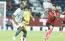Al Duhail's Boubakary Soumare (left) controls the ball.