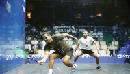 Egypt's Karim Abdel Gawad (left) in action against Qatar's Abdulla Al Tamimi.