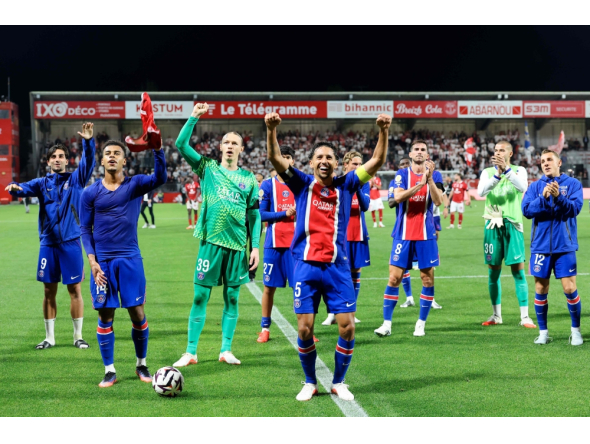 (From L) Paris Saint-Germain's French midfielder #14 Desire Doue, Russian goalkeeper #39 Matvey Safonov, Brazilian defender #05 Marquinhos and defender #03 Lucas Digne celebrate their victory at the end of the French L1 football match between Stade Brestois 29 and Paris Saint-Germain (PSG) at the Stade Francis-Le Ble in Brest on September 13, 2026. (Photo by FRED TANNEAU / AFP)