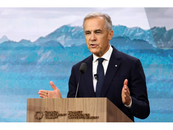 Canadian Prime Minister Mark Carney speaks during the second day of the inaugural Canada Investment Summit in Toronto, Ontario on September 15, 2026. Photo by VALERIE MACON / AFP
