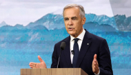 Canadian Prime Minister Mark Carney speaks during the second day of the inaugural Canada Investment Summit in Toronto, Ontario on September 15, 2026. Photo by VALERIE MACON / AFP