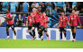Al Rayyan's David García (third left) celebrates after scoring a goal.