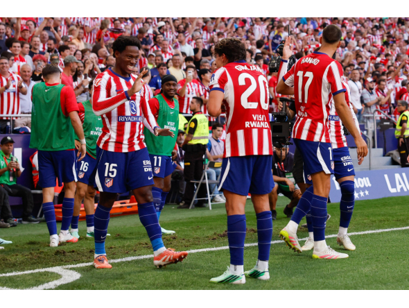 Atletico Madrid's Canadian forward #15 Jonathan David celebrates scoring his team's second goal during the Spanish league football match between Club Atletico de Madrid and Real Madrid CF at the Metropolitano stadium in Madrid on September 20, 2026. (Photo by Oscar DEL POZO / AFP)