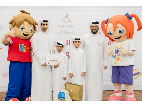 Officials with children during the event.
