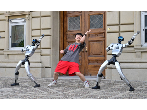 Chinese street dancer Wu Yufei performs alongside Unitree Robotics humanoid robots during a demonstration in Pasadena, California, on September 17, 2026. Photo by Frederic J. Brown / AFP