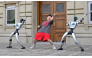 Chinese street dancer Wu Yufei performs alongside Unitree Robotics humanoid robots during a demonstration in Pasadena, California, on September 17, 2026. Photo by Frederic J. Brown / AFP