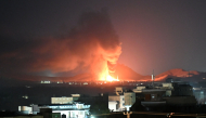 Flames and smoke rise from an area struck by an airstrike in Kandahar on September 24, 2026. (Photo by AFP)