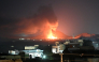 Flames and smoke rise from an area struck by an airstrike in Kandahar on September 24, 2026. (Photo by AFP)