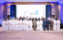 President of UDST Dr. Salem Al-Naemi with other officials and honourees during the ceremony.