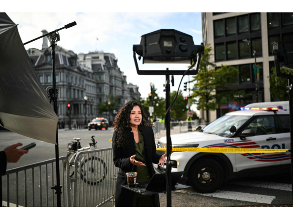 MS Now White House Correspondent Laura Barrَn-Lَpez works on a street corner near the White House in Washington, DC, on September 24, 2026. Photo by Mandel NGAN / AFP