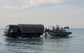 In this undated handout photograph released by the Kazakh Defence Ministry on September 25, 2026, Kazakh military personnel conduct search and rescue operations at an undisclosed location in the waters of the Caspian Sea. Photo by Handout / KAZAKH DEFENCE MINISTRY / AFP