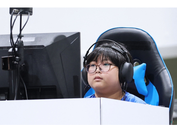 Japan's Yuki Kurihara competes in the Puyo Puyo Champions final of the eSports event during the 2026 Asian Games at the Aichi Sky Expo in Tokoname on September 26, 2026. (Photo by JIJI PRESS / AFP) 