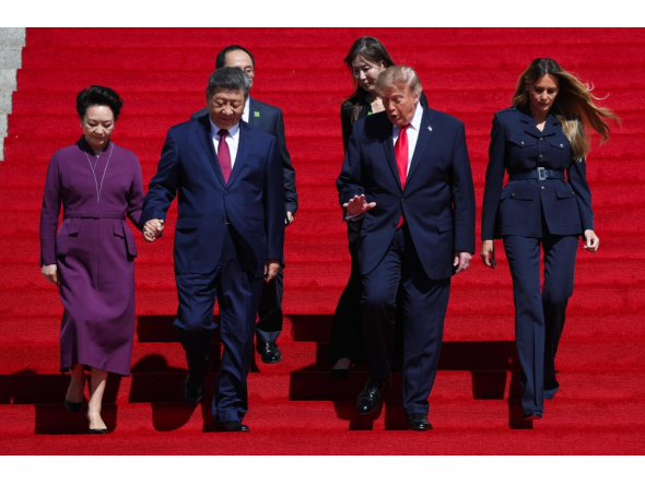 First lady of China Peng Liyuan, President of China Xi Jinping, U.S. President Donald Trump and first lady Melania Trump depart the National Archives Museum following a tour on September 25, 2026 in Washington, DC.  (Photo by Win McNamee/Getty Images/AFP)