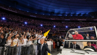 This photo taken on September 25, 2026, by The Vatican Media shows Pope Leo XIV greeting worshippers from the Popemobile car. (Photo by Simone Risoluti / Vatican Media / AFP)