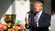 President Donald Trump speaks to the crowd on the first tee during Sunday's Singles on day four of the Presidents Cup 2026 at Medinah Country Club on September 27, 2026 in Medinah, Illinois. (Photo by Sarah Stier / GETTY IMAGES NORTH AMERICA / Getty Images via AFP)