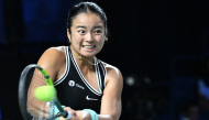Philippines Alexandra Eala hits a return against Russia's Tatiana Prozorova during the WTA Singapore Open Tennis round 16 in Singapore on September 24, 2026. (Photo by Roslan Rahman / AFP)
