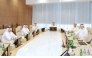 Minister of Commerce and Industry H E Sheikh Faisal bin Thani bin Faisal Al Thani with other officials during the meeting.