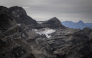 This photograph taken in western Switzerland on September 24, 2026 shows the remains of the now tiny Mauvais glacier, above Les Diablerets. The Swiss Glacier Monitoring Network (GLAMOS) will release its annual report on the state of Swiss glaciers on October 1, 2026. (Photo by Fabrice COFFRINI / AFP)