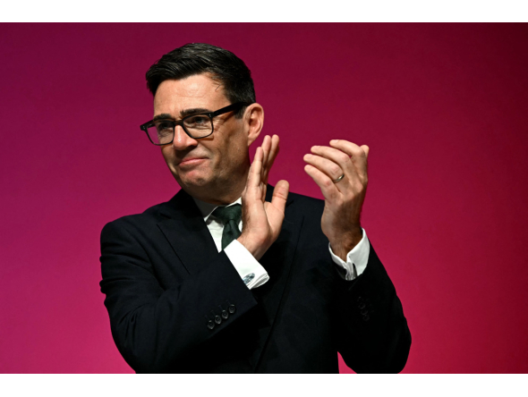 Britain's Prime Minister Andy Burnham applauds on the final day of the annual Labour Party conference in Liverpool, north-west England, on September 30, 2026. (Photo by Paul ELLIS / AFP)