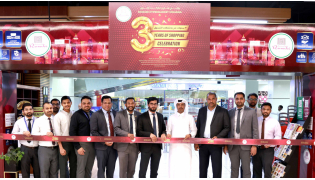 Officials and representatives of Rawabi Hypermarket Izghawa during the ribbon cutting ceremony.