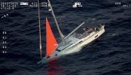This handout image taken on September 26, 2026 and released by the New Zealand Defence Force on October 1, 2026 shows a yacht sinking after a sperm whale struck and cracked the hull in the remote South Pacific. Photo by HANDOUT / NEW ZEALAND DEFENCE FORCE / AFP