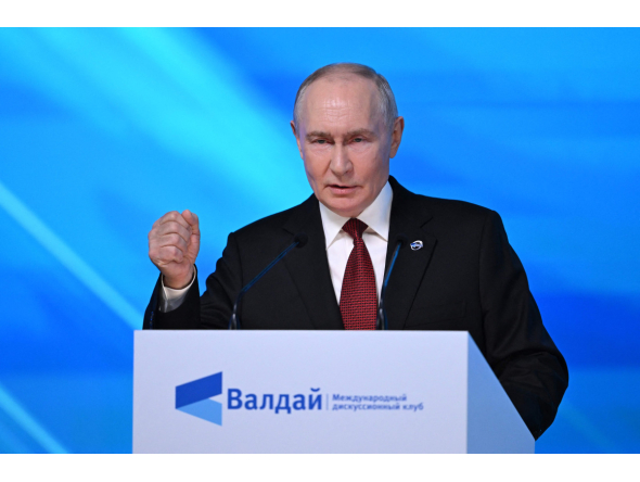 Russia's President Vladimir Putin gestures as he addresses the audience during the Valdai Discussion Club meeting in Moscow on October 1, 2026. (Photo by Igor IVANKO / AFP)
