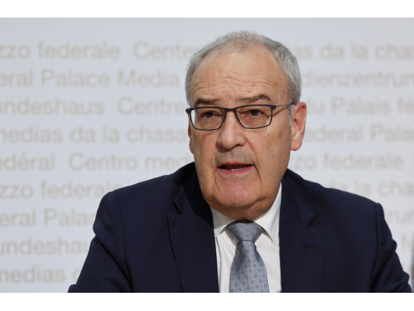 Switzerland's President Guy Parmelin gives a press conference following a vote in the country on a divisive anti-immigration proposal to cap the country's population and another referendum on restricting access to conscientious objection to military service in Bern, on June 14, 2026. Photo by STEFAN WERMUTH / AFP