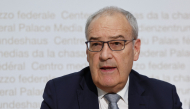 Switzerland's President Guy Parmelin gives a press conference following a vote in the country on a divisive anti-immigration proposal to cap the country's population and another referendum on restricting access to conscientious objection to military service in Bern, on June 14, 2026. Photo by STEFAN WERMUTH / AFP