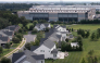 This aerial view shows an Amazon Web Services (AWS) data center adjacent to single-family homes in Stone Ridge, Virginia on August 12, 2026. Photo by Brendan Smialowski / AFP