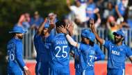 India players celebrate the dismissal of Pakistan's Saim Ayub during the men's cricket final match between Pakistan and India during the 2026 Asian Games at the Korogi Athletic Park in Nisshin on October 3, 2026. (Photo by Andrew Caballero-Reynolds/ AFP)