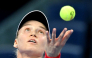 :Kazakhstan Elena Rybakina serves to Armenia Alina Charaeva during their women singles match at the China Open tennis tournament in Beijing on October 3, 2026. (Photo by GREG BAKER / AFP)