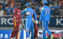 West Indies' captain Shai Hope (2R) and Gudakesh Motie (L) greet India's Ruturaj Gaikwad (2L) and captain Shubman Gill at the end of the third one-day international (ODI) cricket match between India and West Indies at the Maharaja Yadavindra Singh International Cricket Stadium on the outskirts of Chandigarh on October 3, 2026. (Photo by Sajjad HUSSAIN / AFP)