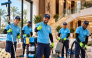 A professional cleaner providing detailed home cleaning services inside a modern residence in Qatar, highlighting the importance of adapting home care to the country’s climate and environmental conditions.