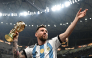 Argentina's captain and forward #10 Lionel Messi pose with the FIFA World Cup Trophy after Argentina won the Qatar 2022 World Cup final football match between Argentina and France at Lusail Stadium in Lusail, north of Doha on December 18, 2022. Photo by Anne-Christine POUJOULAT / AFP